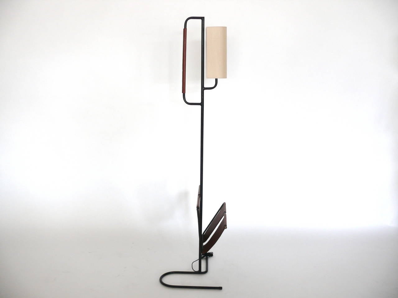 Iron Floor Lamp with Magazine Rack by Jacques Adnet