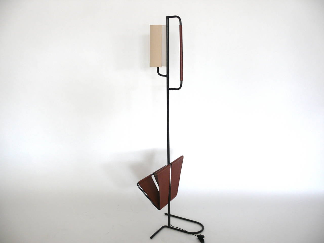 20th Century Floor Lamp with Magazine Rack by Jacques Adnet