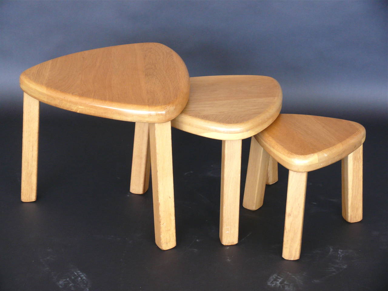 Sculptural set of three nesting tables by Pierre Chapo. French white oak tables look great individually as well. Sold as a set of three. Excellent vintage condition.