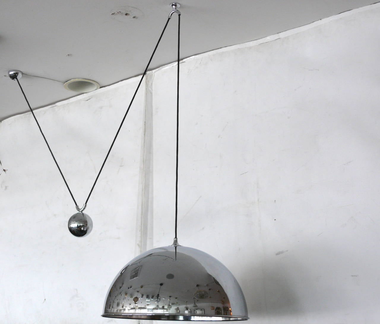 Large nickel counter balance light by Florian Schulz. Impressive dome pendant cloth cord with heavy ball counterbalance. Light is height adjustable. Excellent vintage condition.