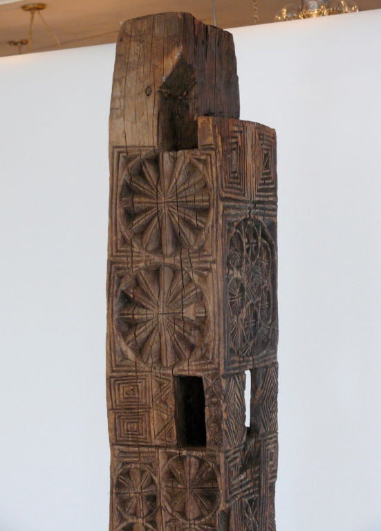 Exquisite hand carved cedar totem pole with ornate carvings and detail. Natural color wood has beautiful distress with age. Wood pole rotates on base and stands over 7' tall. A unique and rare cultural piece of art! <br />
<br />
Base