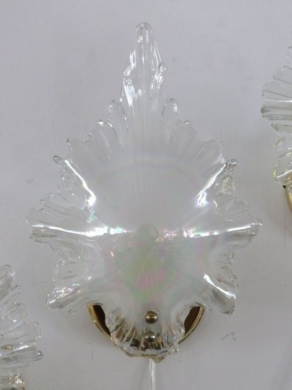 Fantastic single seashell shaped Murano opalescent glass sconce with brass hardware.  Professionally rewired. Only a single is available. 