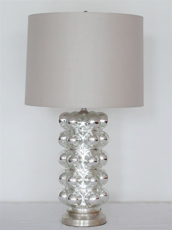 Unique pair of mercury glass lamps with bulbous shape. Great scale, professionally rewired and new grey silk shade. Nickel base and hardware.