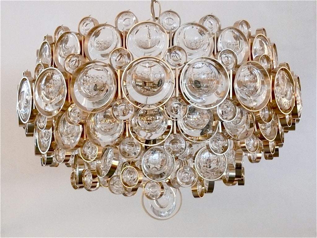 Stunning Italian Sciolari chandelier with individual jewel-like crystals surrounded by individual brass circles. Multiple tiers and sizes of crystals. Large scale and with exquisite detail. <br />
<br />
Professionally re-wired.