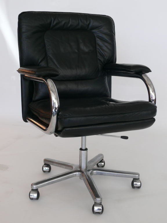 Classic leather desk chair by Pace. Original Black Leather with chrome plated steel tubular arms and 5 star base. 1 available.