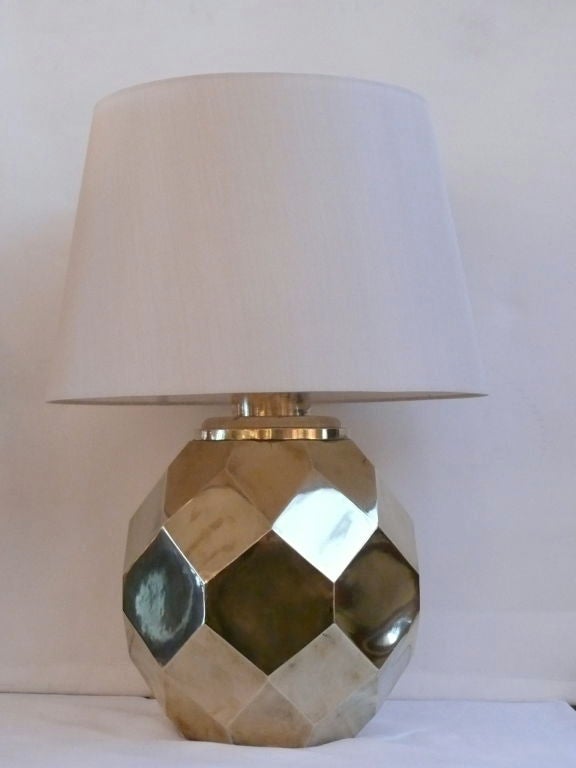 Great pair of hexagon multi-facited lamps made of heavy solid ceramic and plated in brass by Chapman. Handsome and great quality.  New silk shades and newly rewired.