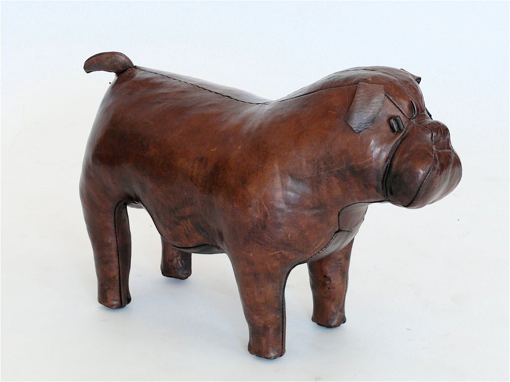 Charming and lovable Abercrombie & Fitch brown leather ottoman crafted to look like a bulldog. This could easily be a decorative object to warm any room. Stamped A&F.