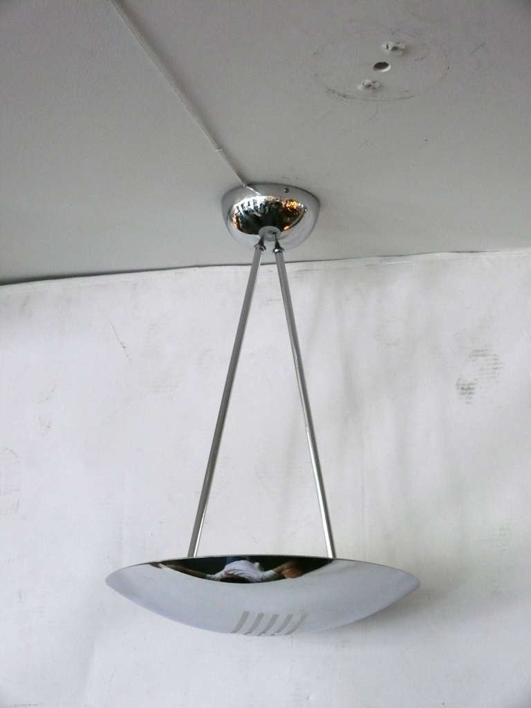 Simple French dome ceiling light with polished chrome dome fixture. Perforated slats on underside to allow light to shine through. Two slender chrome stems and dome canopy add to sleek design. Newly re-wired.