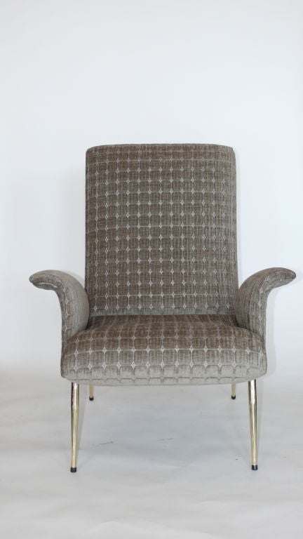 Pair of sculptural Italian chairs newly upholstered in textured grey chenille fabric and polished brass angular legs.