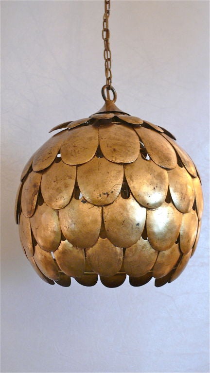 Stunning hollywood regency style gold leafed ceiling light with scalloped edges in an artichoke shape. Nice patina and age. Newly rewired.