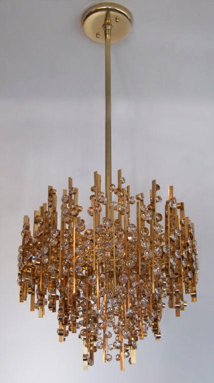 Incredible pendant chandelier by Palwa. Dozens of small individual 
