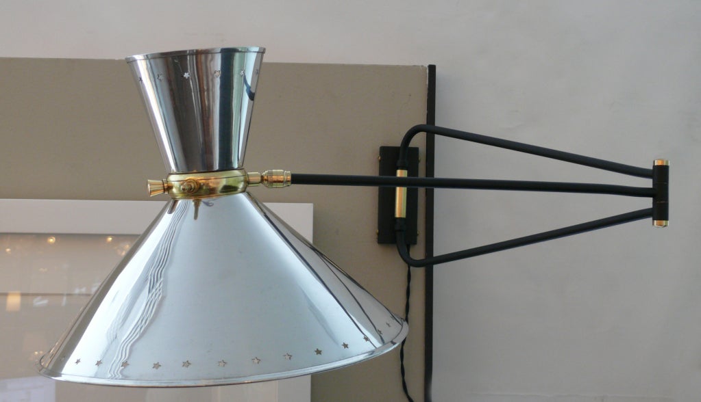 Articulating Sconce in the Style of Guariche at 1stdibs