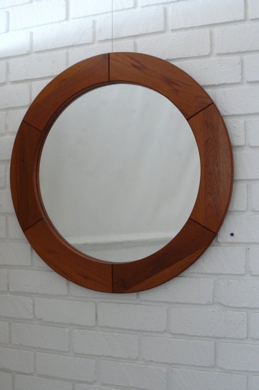 Gorgeous teak mirror by Pedersen and Hansen Viby.  Beautiful rich wood grain with a natural oil finish.  Great statement piece for an entry way.