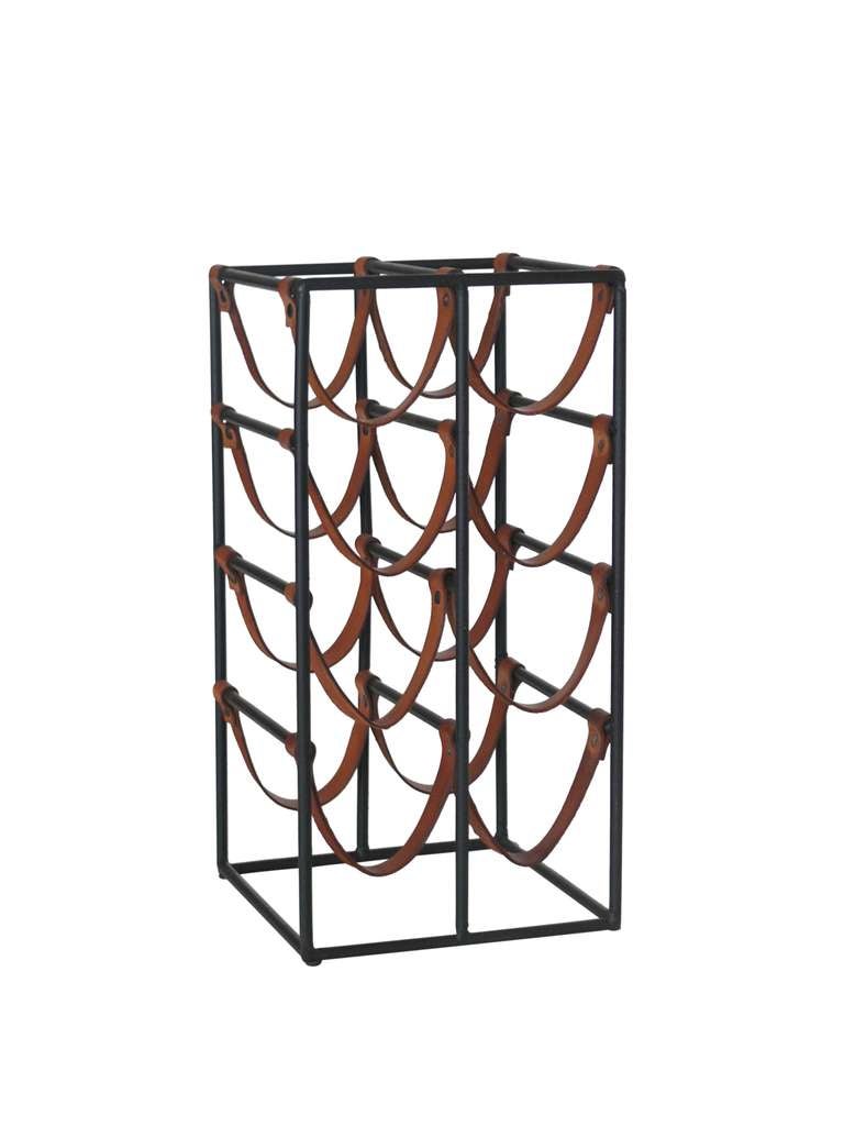 Great wine rack by Arthur Umanoff made of black iron and original brown leather. Leather straps have nice patina and age with black rivets. Holds 8 wine bottles! Also referred to as designed by Paul McCobb. 3 available. 