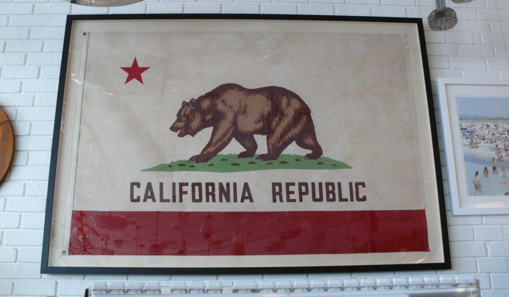 Absolutely incredible California State Flag from the 1940's.  Fantastic weather to the material and newly framed in a linen lined shadow box style.  Over 7 1/2 feet wide! An incredible statement piece.
