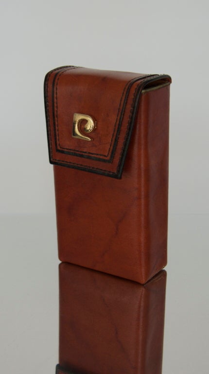 Handsom vintage brown leather Piere Cardin cigarette case.  Great size and could even work as a case for a compact digital camera.  Beautiful leather and hand made detail.  Marked 