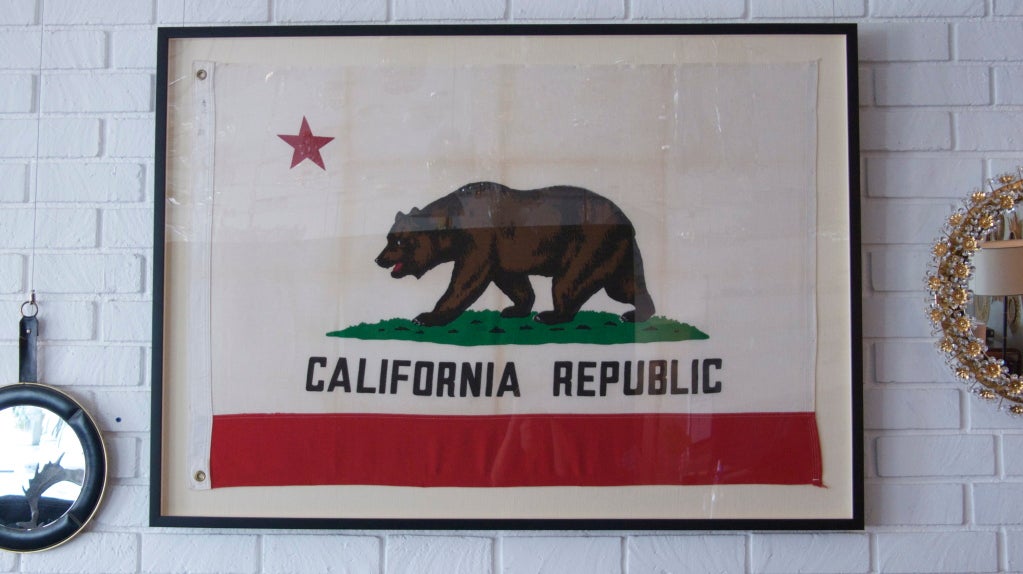Absolutely incredible California State Flag from the 1940's. Fantastic weather to the material and newly framed in a linen lined shadow box style.  A gorgeous statement piece!