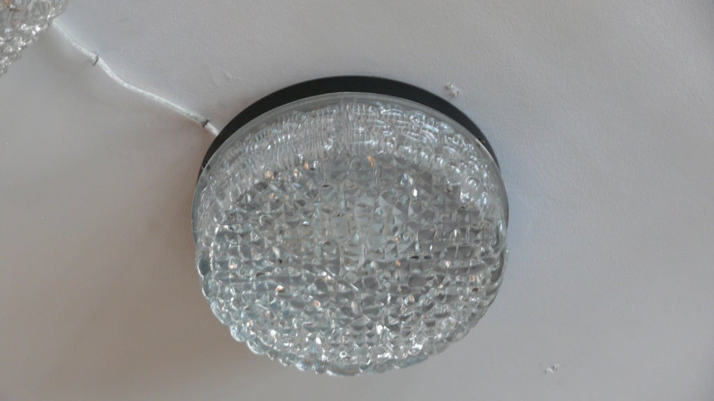 Lovely Austrian textured bubble glass flush mount.  Black metal base and fantastic bubbled glass shade.  Looks superb illuminated and professionally rewired.