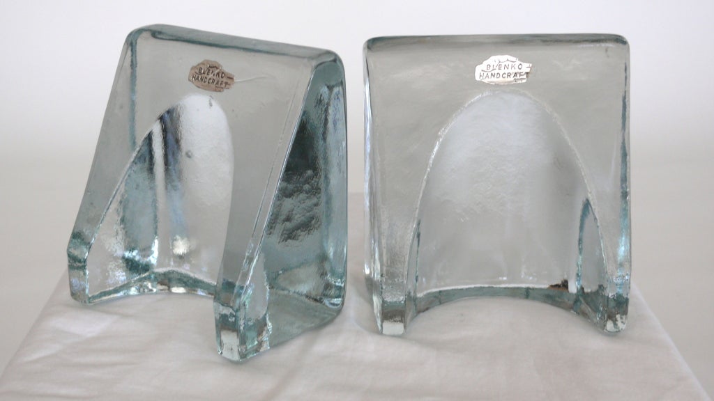 Beautiful thick glass bookends with deep curve in glass. Made by Blenko. Great gift!