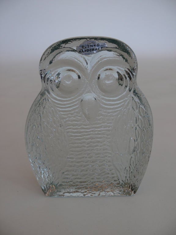 Fantastic set of hand crafted glass bookends by Blenko. Thick glass cut in the shape of an owl with intricate cut-outs and textured carving for the eyes and body. Original labels on both. Cool and whimsical objects!