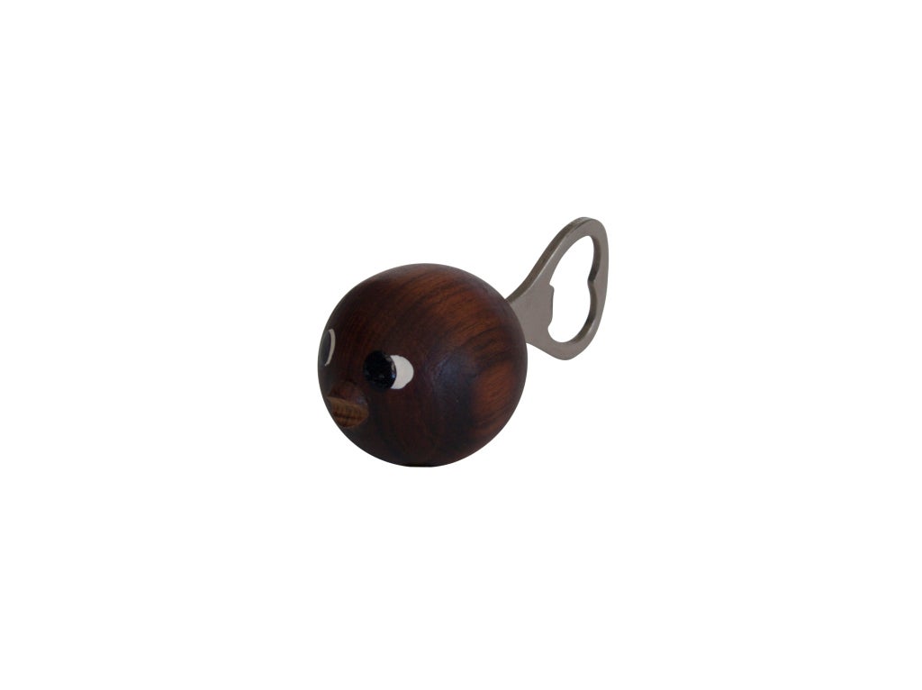 Whimsical teak wood ball with fish face and metal bottle opener as tail. Original 