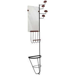 Rare Leather and Iron Wall Rack by Jacques Adnet
