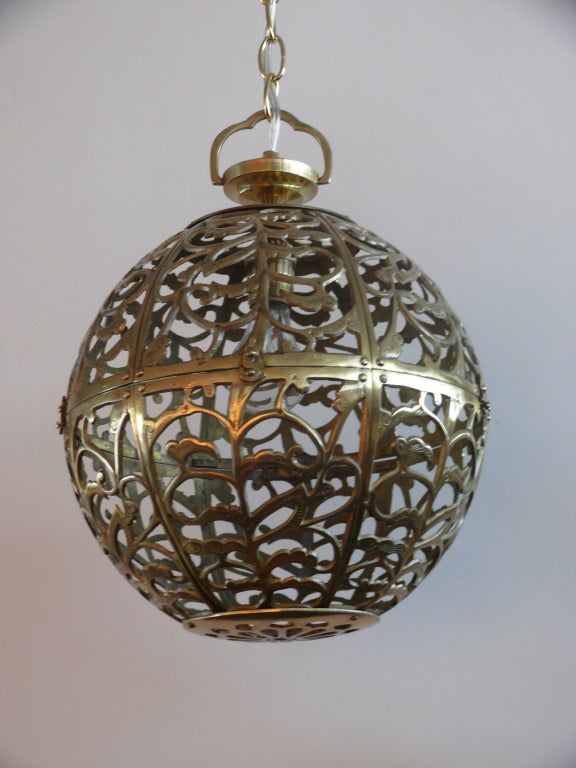 Beautiful solid cast brass globe with beautiful filigree design and great patina. Newly re-wired.