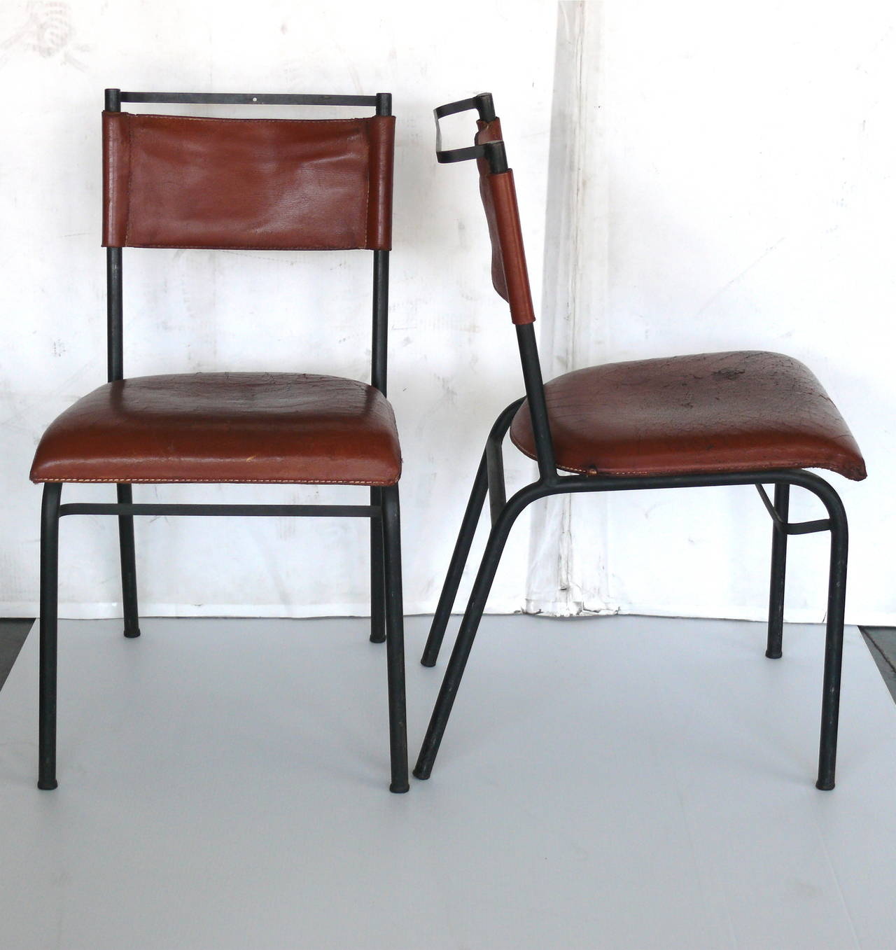 Pair of Jacques Adnet Chairs In Fair Condition In Beverly Hills, CA