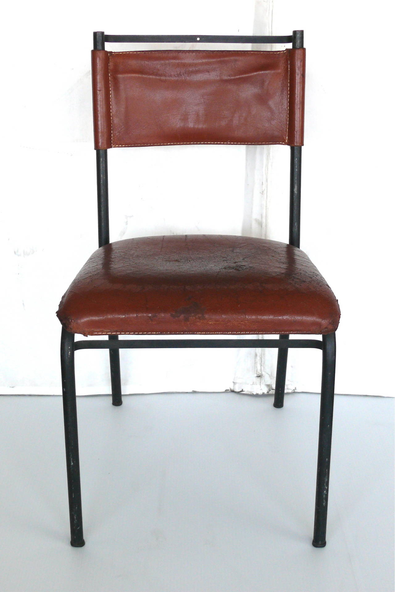 Mid-20th Century Pair of Jacques Adnet Chairs