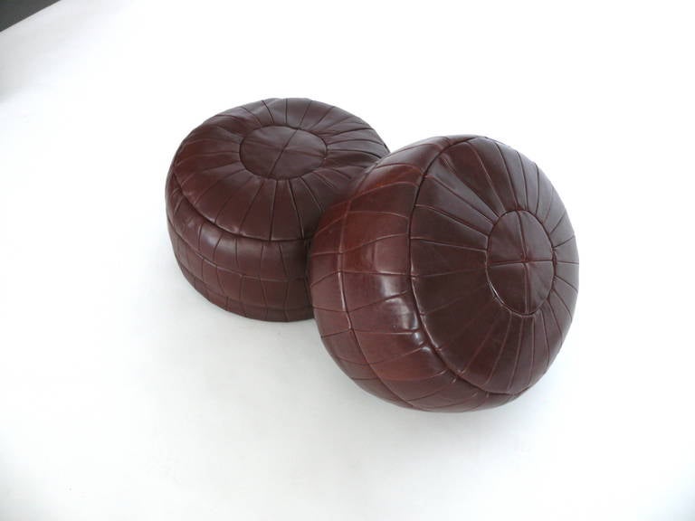 Beautiful hand made Moroccan poufs. Brown leather poufs with patchwork detail. Can be used as a foot stool or ottoman. Perfect pop for any room! Only one pouf still available.