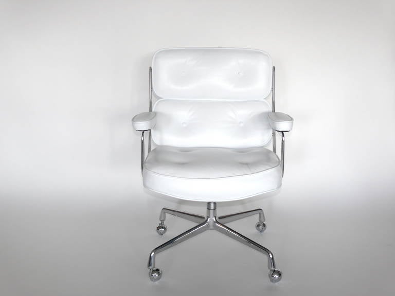 Classic office chair from the Time Life Building in New York. Designed by Eames featuring new white leather and a newly polished chrome base. Chair is height adjustable with tilt and swivel. Can be COL or COM. Other colors available and sold