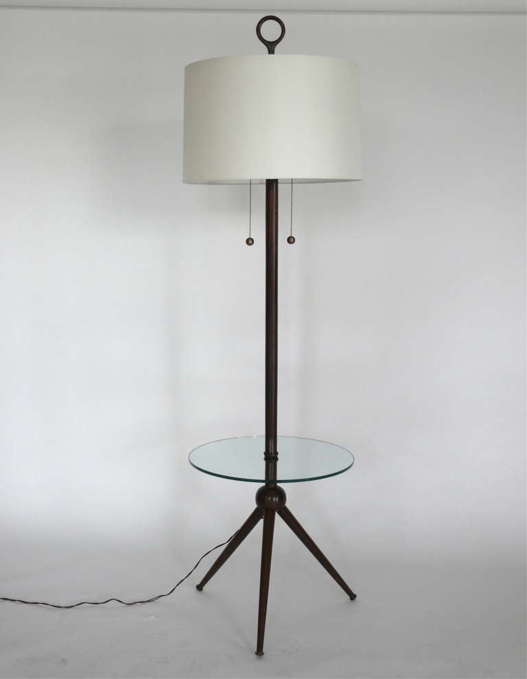 Italian inspired tripod table floor lamp produced by Orange. Gorgeous mahogany throughout slender lamp and base. New silk shade and glass table. Perfect next to a sofa or pair of chairs!