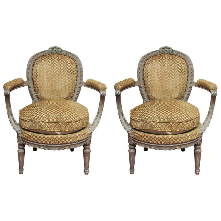 Pair of Beaux Arts Painted oval back armchairs