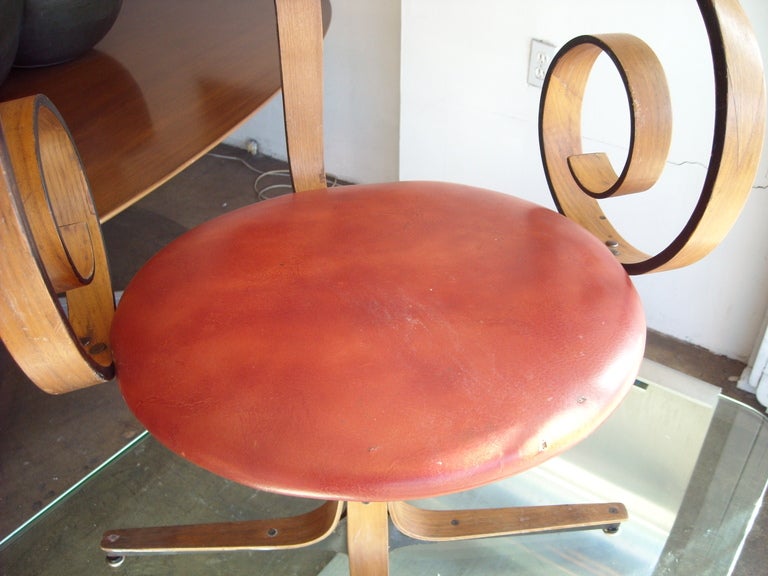 Nice and rare swivel desk chair designed by Mulhauser .