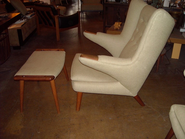 This an amazing 3 pieces set of two teak armchairs and ottoman by Hans Wegner. We can sell one chair and ottoman as a set, request price and details.