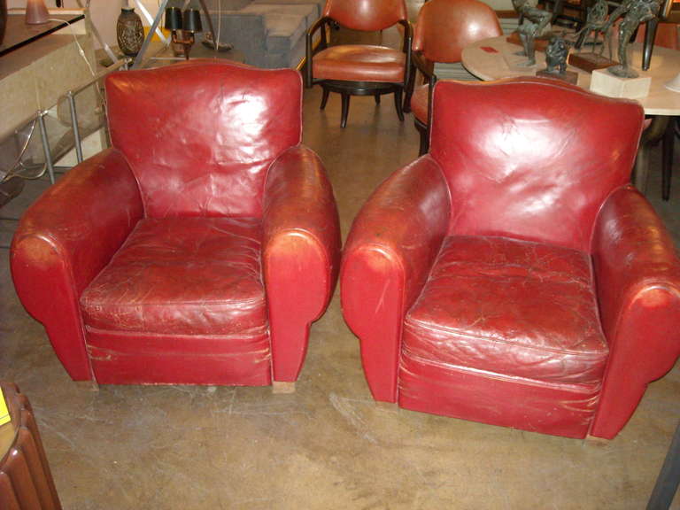 Just and amazing red old leather in a distressed condition and you can see the old under seat linen.  Please if you need more pictures, just ask.