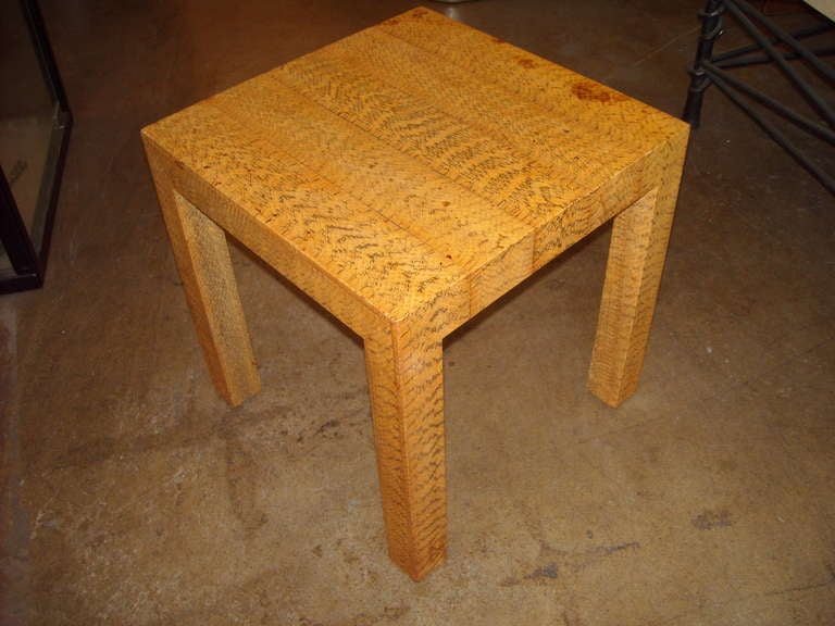 Very nice and simple side table in faux snakeskin .
