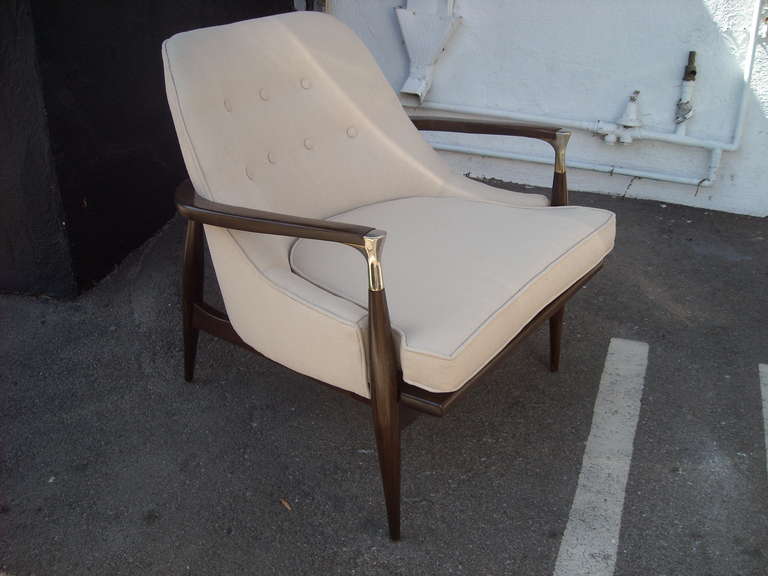 Nice and elegant I B Kofod chair with nice metal detail in the arm rest end.Has been refinished and reupholstered.