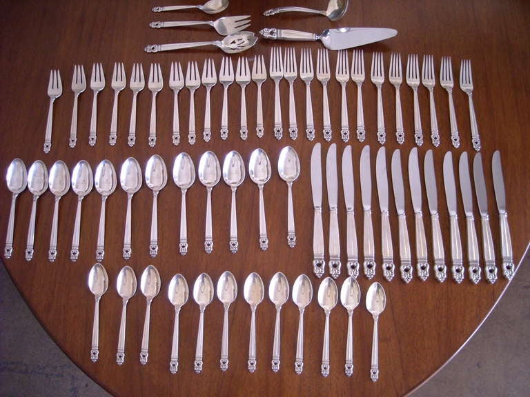 Royal Danish patented in 1939 an Acorn style like Georg Jensen did in 1919 a similar line. This is a 5 pcs for 12 and 5 servings.Total 65 pieces.Set is Marker, Royal Danish , USA, Sterling International Co.