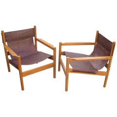 Pair of Michel Arnoult sling leather Safari chairs , Brazil