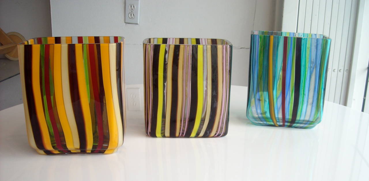 Very nice and vibrant colors, set of three Murano handblown vases, designed to be stacked or horizontal, all signed. Where issued for Salviati, an edition of 15 each sets of three. Dated 2001, Italy.