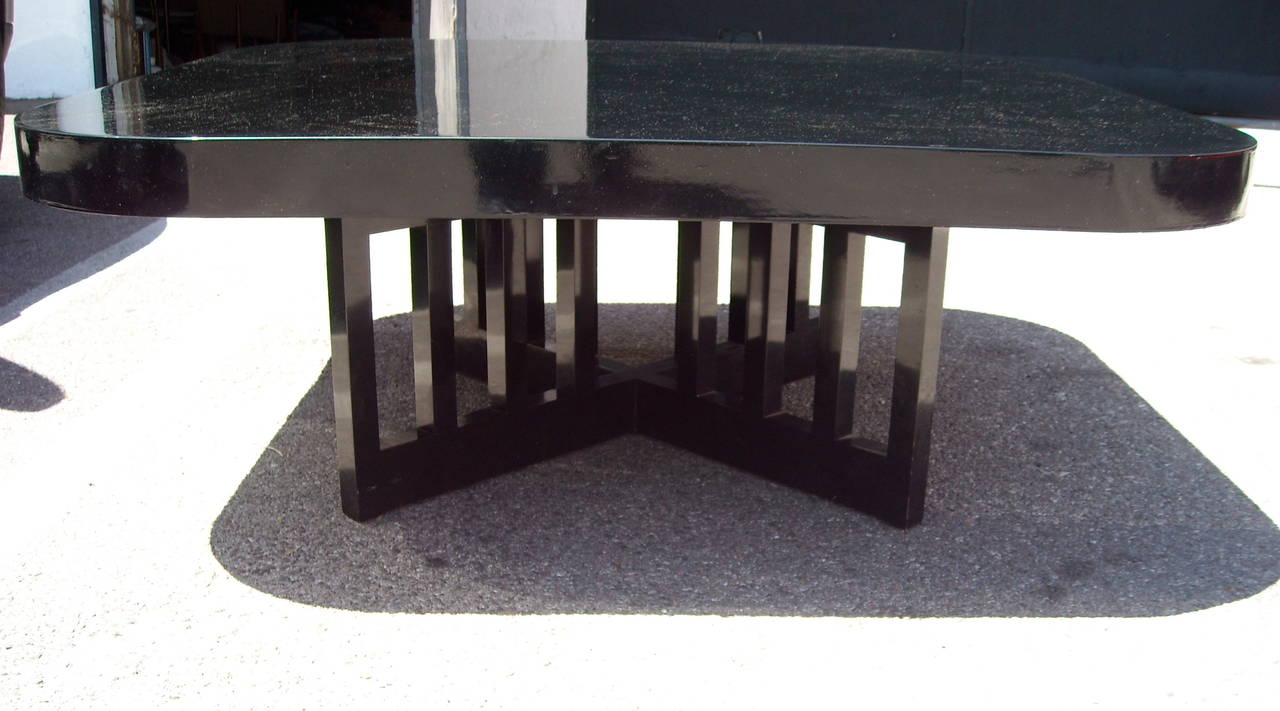 Nice and great design in this coffee table in black lacquered wood. Unmarked.