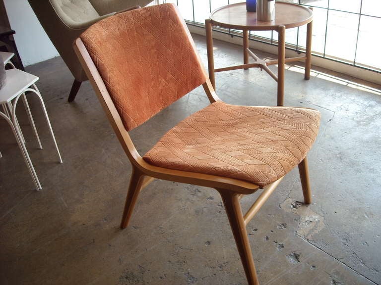 Well known chair by Peter Hvidt. Has vintage fabric.