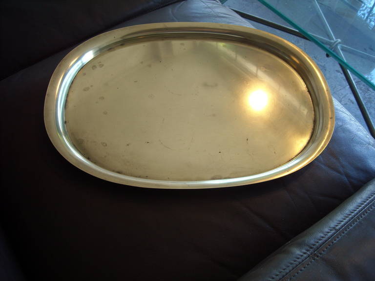 This is a rare tray, maybe made in the late 60 or early 70's , is in a vintage condition, has some patina and needs a nice polish, is acid mark , Piet Hein design for Georg Jensen Denmark 7003.