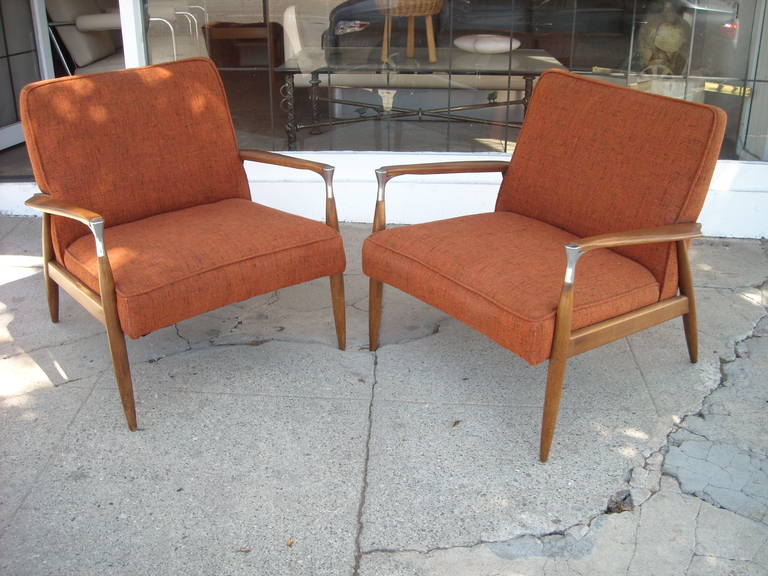 Very nice and elegant with a metal accent corner armrest chairs. They are in the original condition, cleaned wood and replated metal corner also seems original fabric.