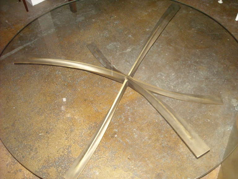 Michel Mangematin round bronze and glass coffee/cocktail table In Good Condition In Los Angeles, CA