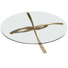 Table basse/cocktail ronde en bronze et verre Michel Mangematin
