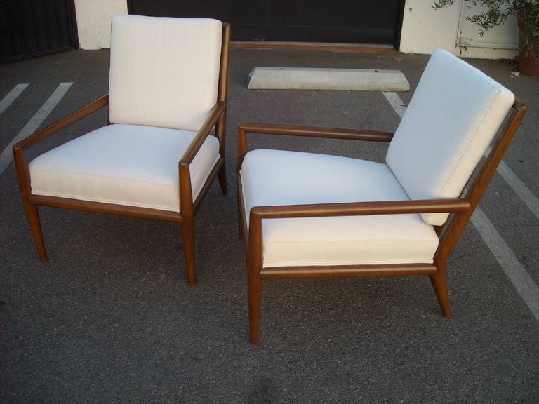 Classic and elegant pair of T.H. Robsjohn-Gibbings lounge or armchairs, for Widdicomb. Refinished and reupholstered.