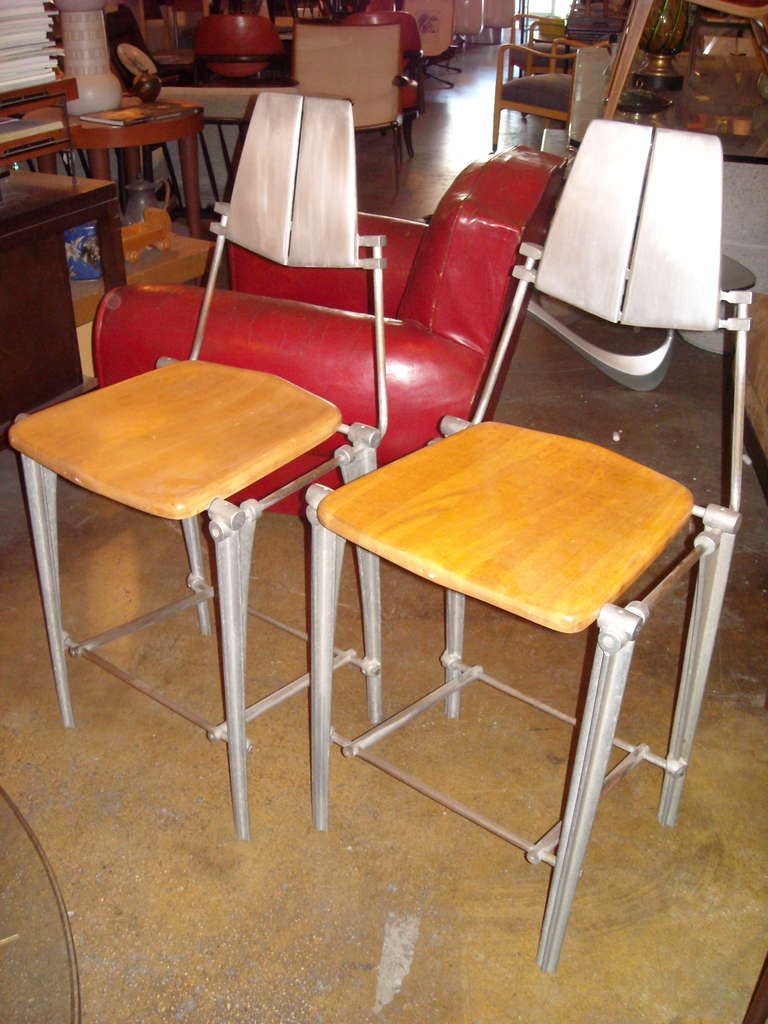 Great design in this pair of aluminum and maple seat, by Robert Josten.