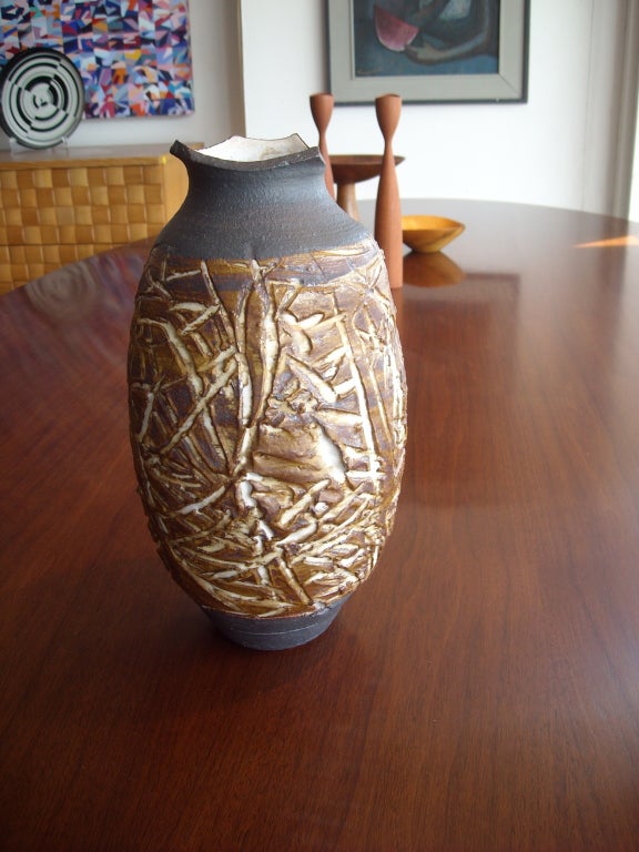 Very interesting shape in this studio ceramic vase , signed , by Raul Coronel.